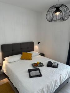 Postel nebo postele na pokoji v ubytování Iris apartment