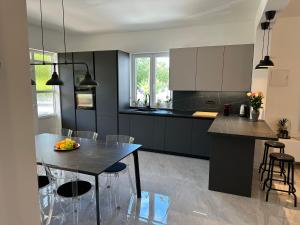 Kuchyň nebo kuchyňský kout v ubytování Iris apartment