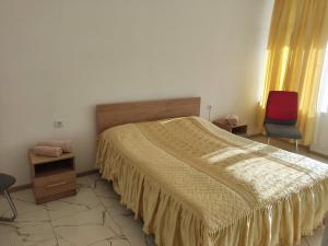 Postel nebo postele na pokoji v ubytování Hotel Talin