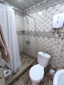 Koupelna v ubytování Hotel Talin