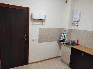 Kuchyň nebo kuchyňský kout v ubytování Hotel Talin