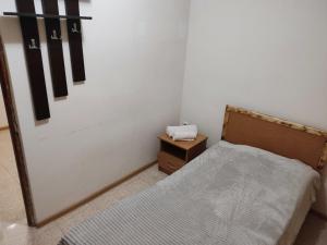 Postel nebo postele na pokoji v ubytování Hotel Talin