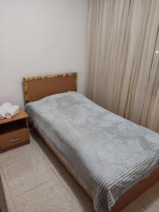 Postel nebo postele na pokoji v ubytování Hotel Talin