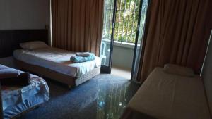 Postel nebo postele na pokoji v ubytování Beiruth Hotel