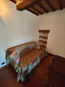 Postel nebo postele na pokoji v ubytování Agriturismo Podere Chiassaie