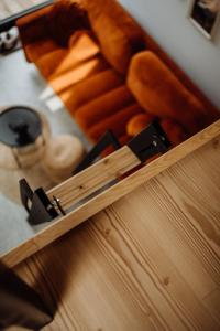 a box of bread and a knife on a table at LASpot Szafarnia in Szafarnia +32 photos