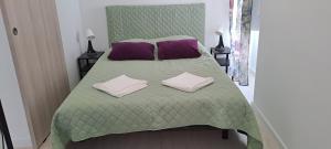 Postel nebo postele na pokoji v ubytování Setubal Holiday Apartment