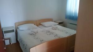 Postel nebo postele na pokoji v ubytování Guest House Lav