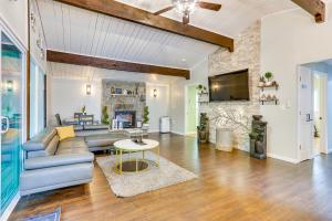 a living room with a couch and a table at East Stroudsburg Home Near Skiing and Del Water Gap! in East Stroudsburg