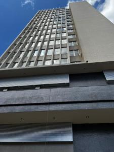 a tall building with a lot of windows at Samba Belo Horizonte Vintage in Belo Horizonte