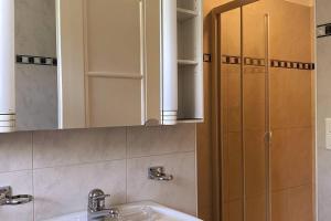 Koupelna v ubytování Chesa Giulia St.Moritz + 8 fotografií