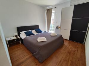 Postel nebo postele na pokoji v ubytování Guest House Adria