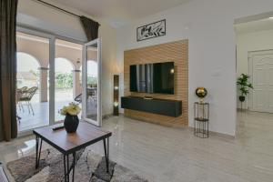 TV a/nebo společenská místnost v ubytování Bralic Residence