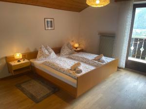 Postel nebo postele na pokoji v ubytování Haus Käfersberg