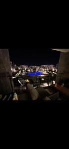 a view of a city at night at marassi chalet in El Alamein