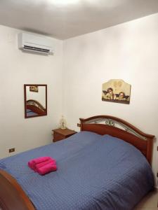 Giường trong phòng chung tại RANCH34 Villetta indipendente con patio