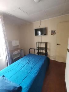 Postel nebo postele na pokoji v ubytování Casa Kitus