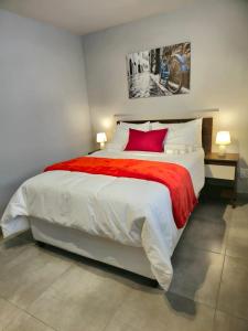 A bed or beds in a room at Circa Aparthotel - 1 Bedroom Apartment - close to Menlyn