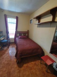 Postel nebo postele na pokoji v ubytování Casa Kitus
