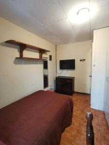 Postel nebo postele na pokoji v ubytování Casa Kitus