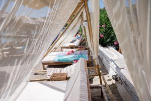 A bed or beds in a room at Hotel Pavlou