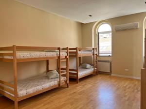 Letto o letti in una camera di Joy Hostel