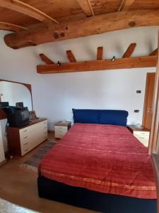 Postel nebo postele na pokoji v ubytování Il Paradiso CIR 0003
