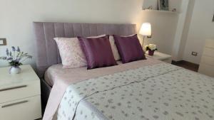 Кровать или кровати в номере Sunnyside Accademia