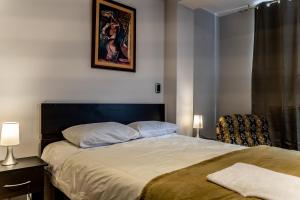 Postel nebo postele na pokoji v ubytování Jacky's Home Bolognesi