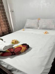 Postel nebo postele na pokoji v ubytování Camp Taveuni