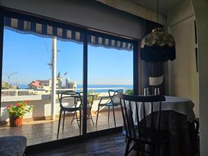 a dining room with a view of the ocean at Hotel Restaurant CapDucal in Viña del Mar