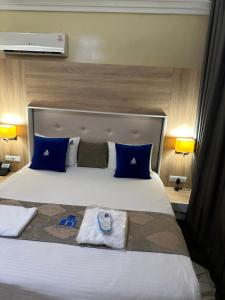 Hôtel Esma Nouadhibou客房内的一张或多张床位