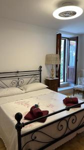 Giường trong phòng chung tại Lorenzo il Magnifico
