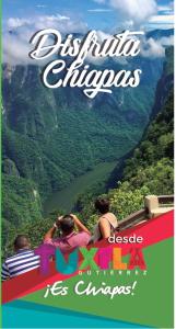 three people sitting on a train looking at a valley at Hotel Santo Domingo in Tuxtla Gutiérrez