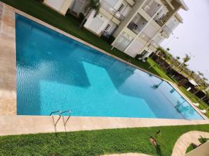 シディ・ラハルにあるCasabay Sidi Rahal plage vue sur piscine et merのギャラリーの写真