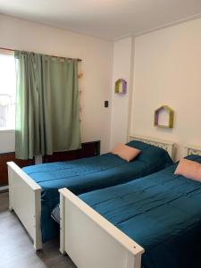 Llit o llits en una habitació de Directo en Santafetemporarios Departamento Amueblado zona Recoleta Santa Fe