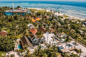 an aerial view of a resort and the beach at Villa Manouch in Nusa Lembongan