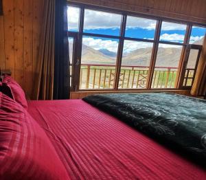 Ένα ή περισσότερα κρεβάτια σε δωμάτιο στο Miklam Homestay by StayApart +8 φωτογραφίες