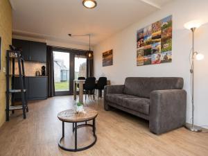 Χώρος καθιστικού στο Holiday home Vakantiepark 't Eibernest Texel