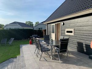 Holiday home in a holiday park directly on the recreational lake and the Veluwe