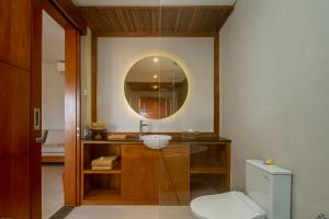 Koupelna v ubytování The Runik Ubud + 47 fotografií