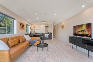 Kuchyň nebo kuchyňský kout v ubytování Lakeside Living - Alpine 1A + 7 fotografií