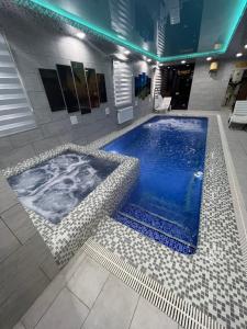 Bazén v ubytování HOTEL DaMir nebo v jeho okolí