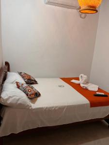 a bed in a room with at Casa Faccioli in Mompos +51 photos