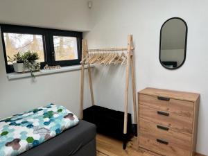 Postel nebo postele na pokoji v ubytování Dolní Morava- Apartmán v Prostřední Lipce