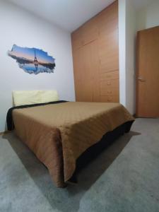 Ein Bett oder Betten in einem Zimmer der Unterkunft Bello y económico departamento