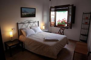 Posteľ alebo postele v izbe v ubytovaní Casa Rural Azahar