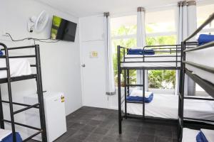 Postel nebo postele na pokoji v ubytování Hoey Moey Backpackers