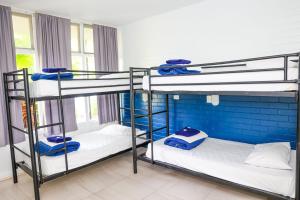 Postel nebo postele na pokoji v ubytování Hoey Moey Backpackers