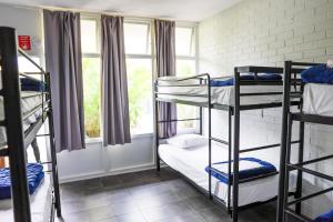 Postel nebo postele na pokoji v ubytování Hoey Moey Backpackers + 37 fotografií